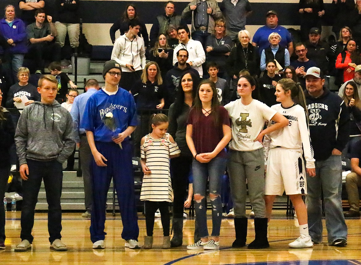 Photo by MANDI BATEMAN
Kameron Hill and his family during senior night.