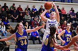 Kats cruise past Libby at home, 62-41