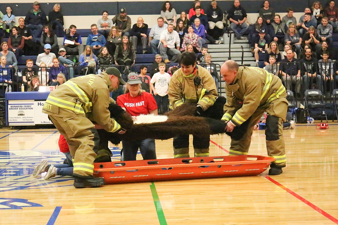 Buddy Badger played the victim in a lesson about hands only CPR during halftime last Friday at the Bonners Ferry High School.