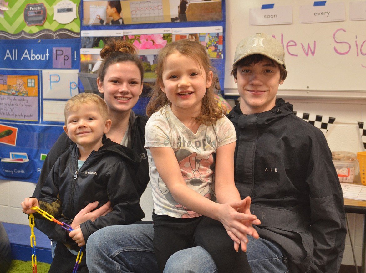 Six-year-old Danni Hill of Noxon, &#147;feeling good&#148; after finishing chemotherapy for leukemia, pauses for a picture with her siblings Alivia, Brody (who will play in the Noxon JV game Saturday) and little Ryker. (Carolyn Hidy/Clark Fork Valley Press)