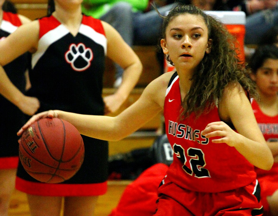 Rodney Harwood/Sun TribuneOthello sophomore Maciah Tovar (22) looks to send the pass inside during the first half of Tuesday's game in the Jungle. The Othello girls qualified for the CWAC District tournament for the first time in nine years.