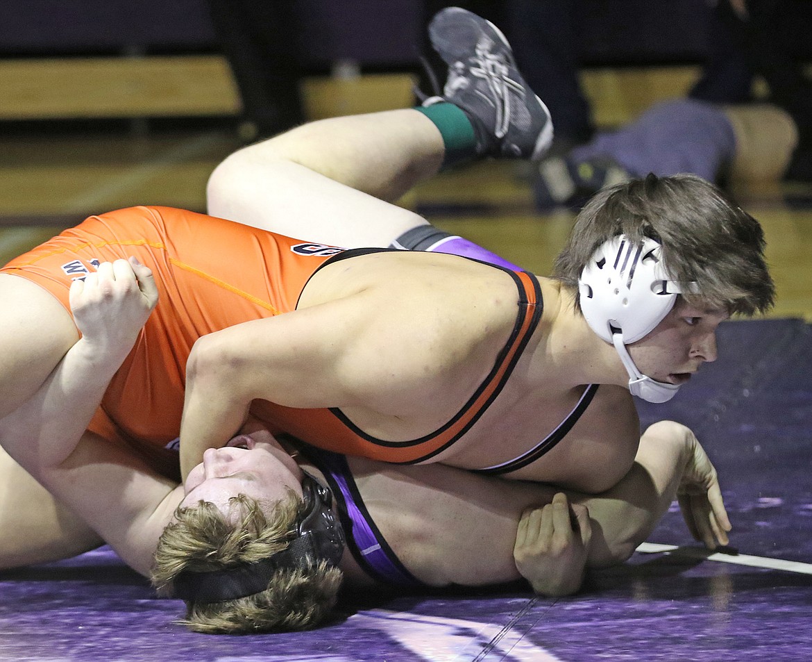 Justin Mays of Ronan wins his match by fall over Pirate wrestler Aaron O&#146;Roake in the 205-pound weight class at Polson High School last Thursday night.