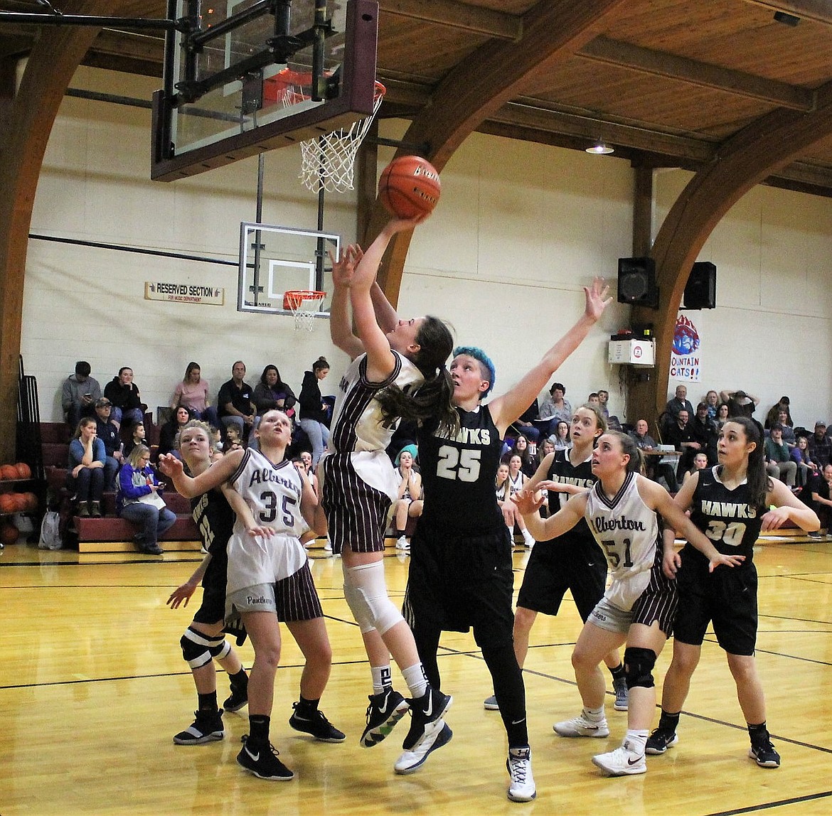 Sorren Reese jumps for a basket during the Clark Fork Mountain Cats game against Seeley-Swan on Jan. 25 in Alberton. The Lady Cats lost, 55-32. (Kathleen Woodford/Mineral Independent)