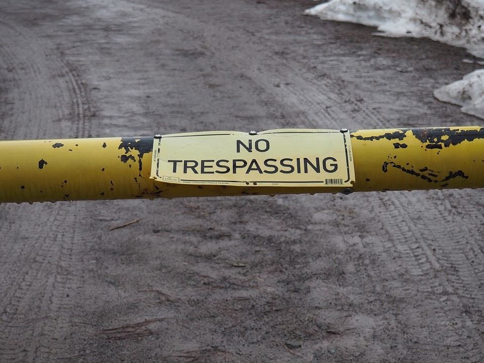 The battle over the closure of Cyr Iron Mountain Road has been dragging on for the past six years. Diane Magone, who formerly accessed the road on a regular basis, continues to research ways to get the it back open. The property was sold to the Wheaton Brothers, and they gated the road &#151; claiming there is no proof of it being public property. (Photo courtesy of Diane Magone)