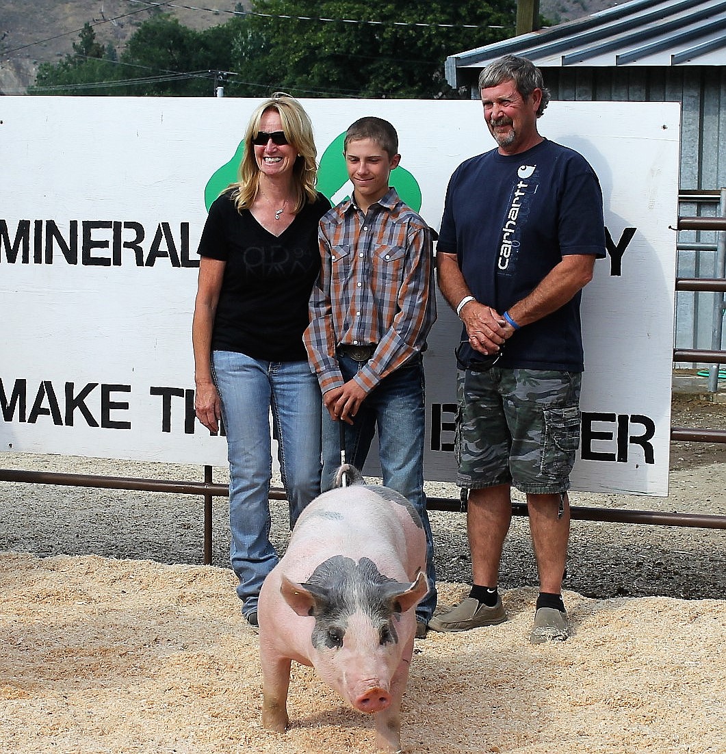 Mineral County 4-H member Decker Milender sold his hog, Mystic, to owners of the Big Sky Motel at the 2018 4-H Livestock Auction. He won first place in the light carcass division in the Montana Symbol of Excellence Program on Jan. 17. (Kathleen Woodford/Mineral Independent)