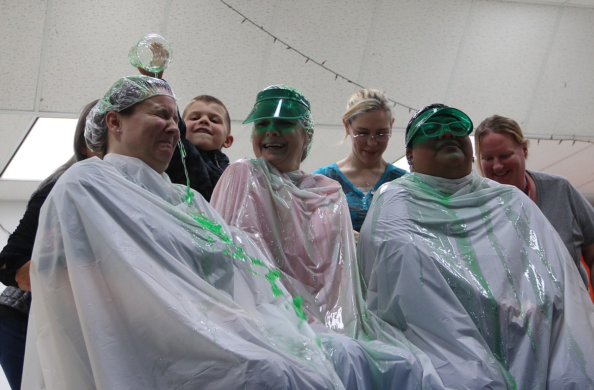 (Photo by MARY MALONE)
Idaho Hill Elementary students who completed the second quarter reading challenge were rewarded by sliming three of their teachers with jello last Thursday.