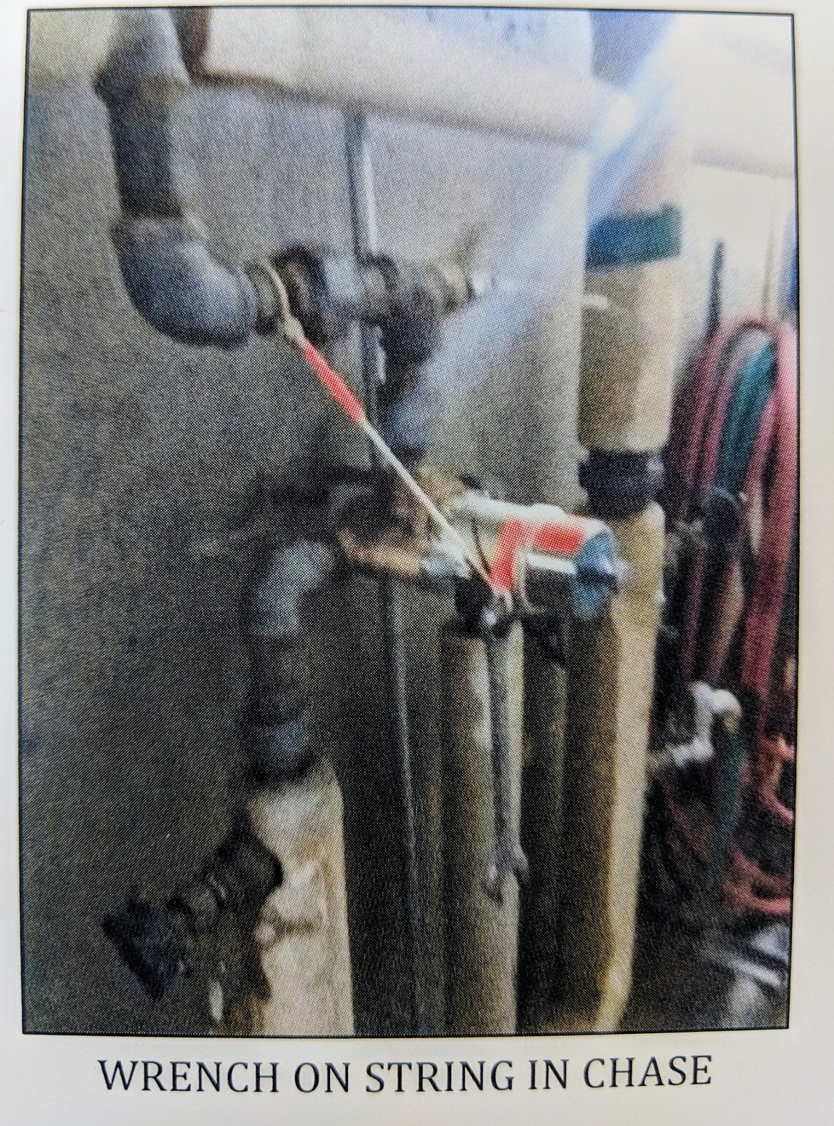 Courtesy photo
The wrench on a string mentioned in the report that is available to employees to adjust a leaky pipe, located in one of the chases between cell blocks.