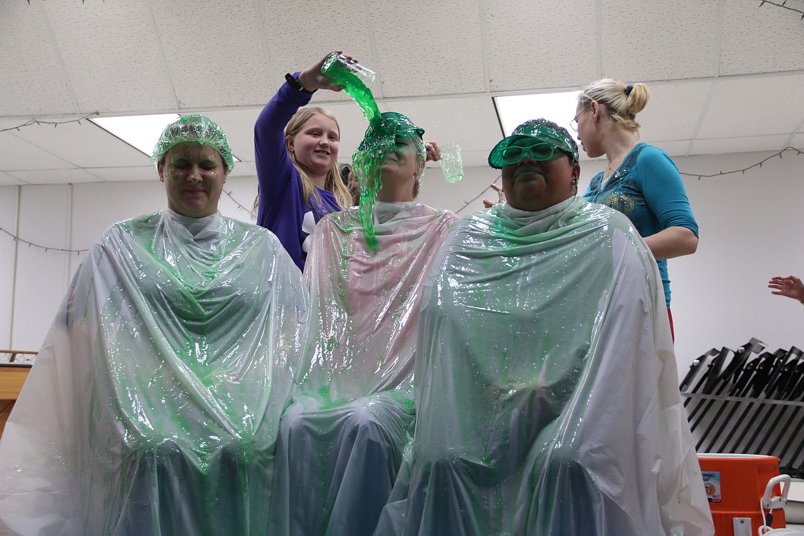 (Photo by MARY MALONE)
Idaho Hill Elementary students who completed the second quarter reading challenge were rewarded by sliming three of their teachers with jello last Thursday.