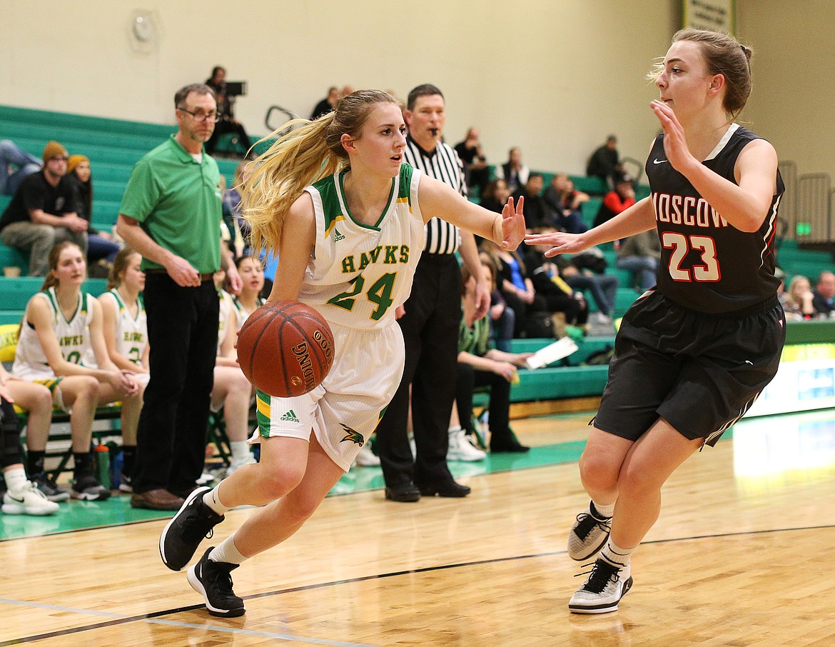 Lakeland&#146;s Izzy Kirk drives with the ball around Moscow defender Isabella Bazzoli in the second half of Friday night&#146;s 4A Region 1 Championship game. (LOREN BENOIT/Press)