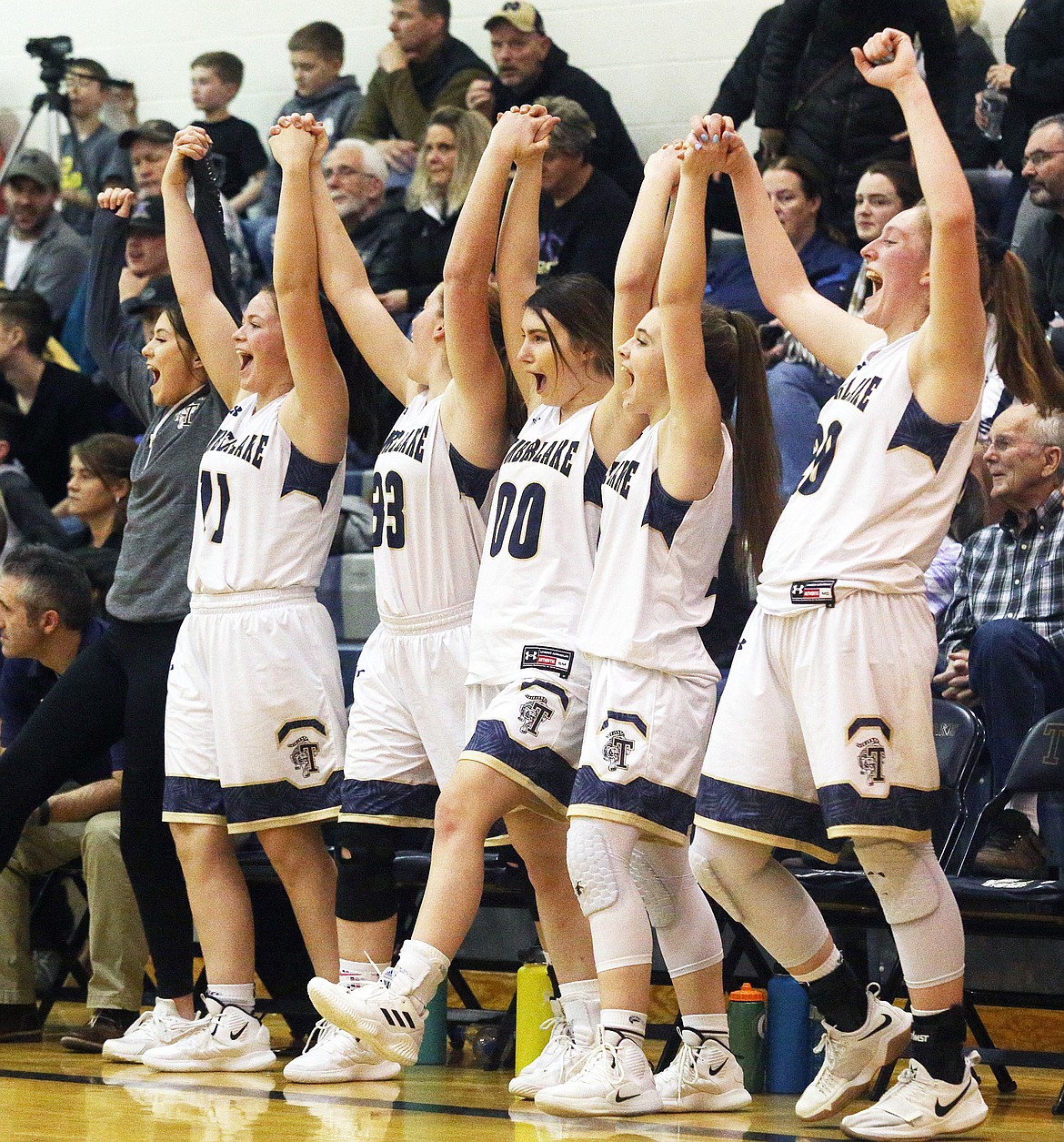 LOREN BENOIT/Press
The Timberlake Tigers celebrate their 52-19 3A District 1 championship win against Kellogg.