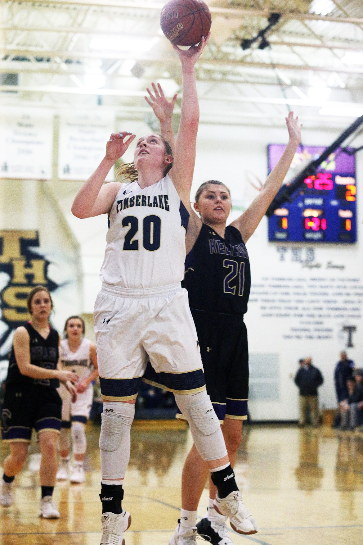 Timberlake&#146;s Brooke Jessen goes for a layup against Kellogg&#146;s Cierra Brandt in the 3A District 1 Championship game in Spirit Lake. (LOREN BENOIT/Press)