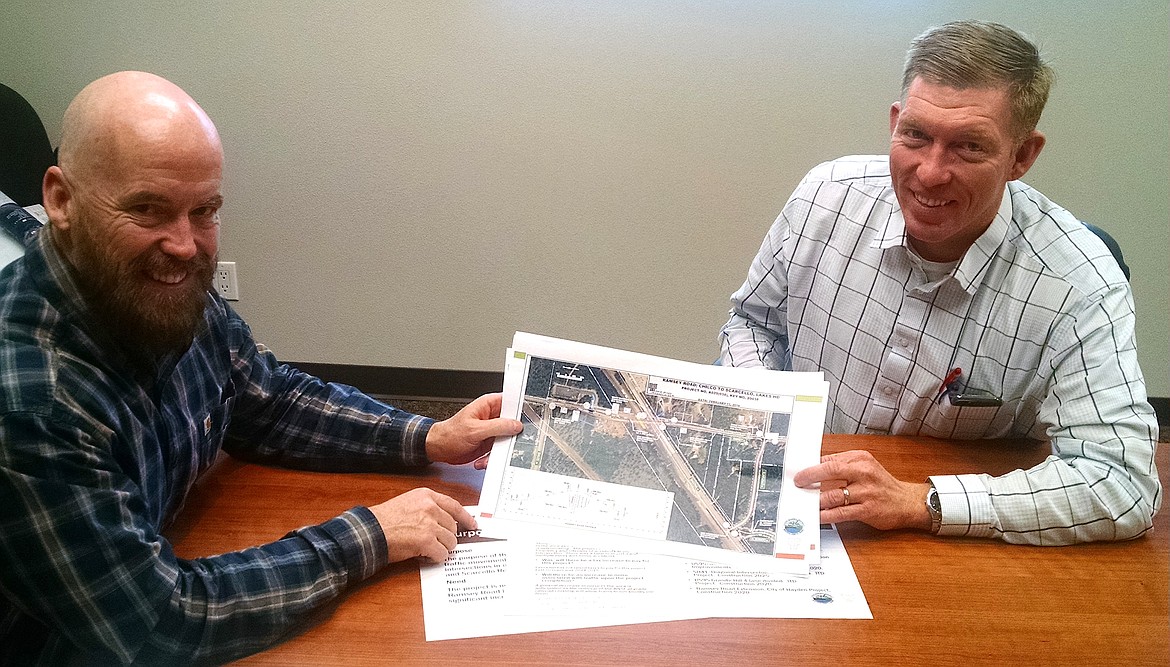 Eric Shanley, left, director of highways for the Lakes Highway District, and Rusty Leahy, transporation engineer for David Evans and Associates, have coordinated planning efforts on the Ramsey Road safety project. An open house will be held on Tuesday from 4 to 7 p.m. at the highway district, 11341 N. Ramsey, Hayden. (BRIAN WALKER/Press)