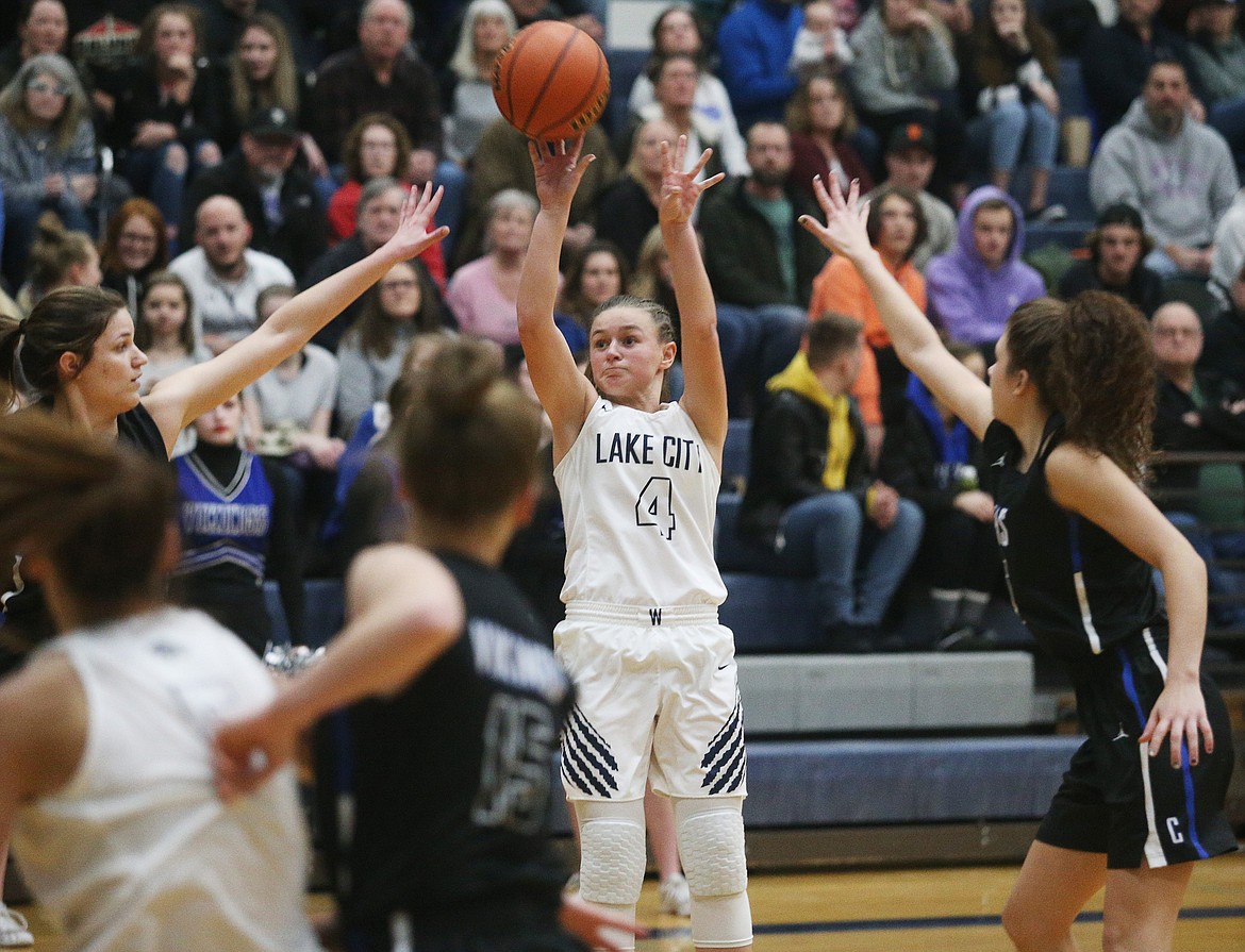 Lake City&#146;s Chloe Teets shoots a three pointer in the second half of Tuesday night&#146;s 5A Region 1 championship game against Coeur d&#146;Alene. (LOREN BENOIT/Press)