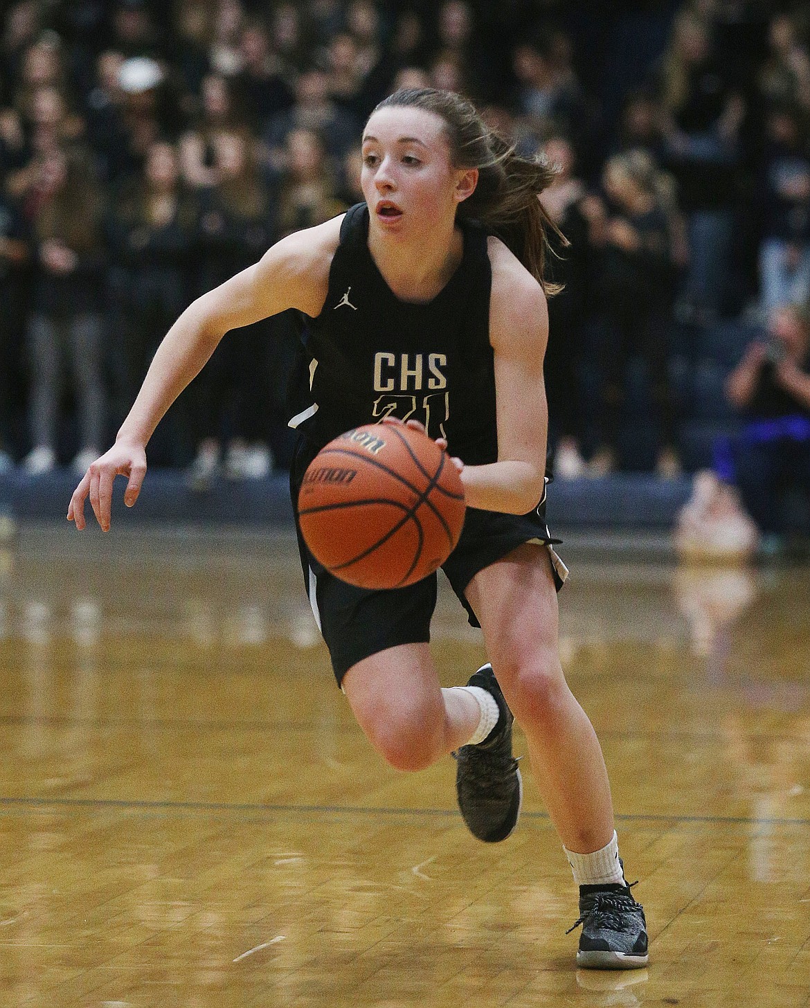 Coeur d&#146;Alene&#146;s Jaden Chavez dribbles the ball down the court during Tuesday night&#146;s game at Lake City. (LOREN BENOIT/Press)