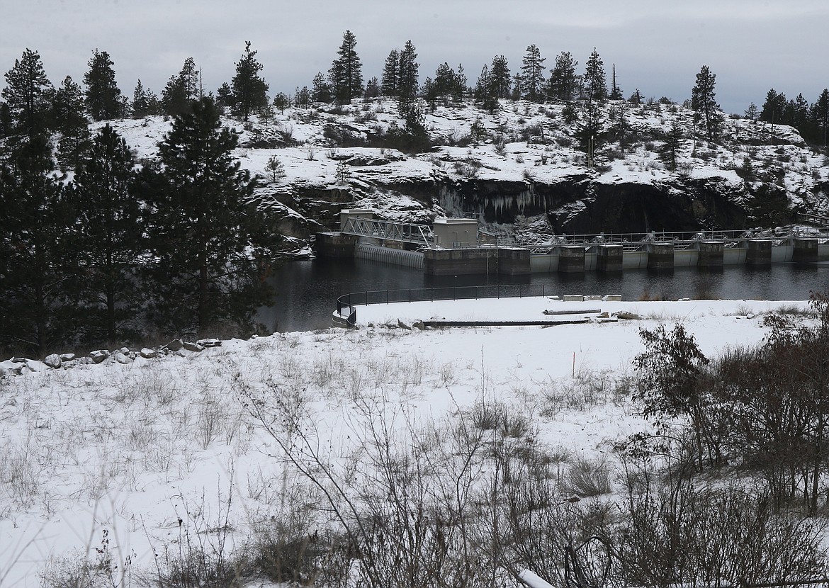 The city of Post Falls, Avista and Liberty Bankers Life Insurance Company, which owns the Post Falls Landing site on the Spokane River, are working on the project that would feature an overlook above the river, an outdoor amphitheater and trail to Falls Park. (LOREN BENOIT/Press)