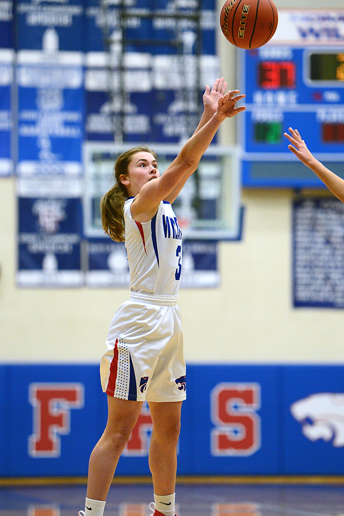 Columbia Falls' Maddie Robison (3) shoots an open three against Browning at Columbia Falls High School on Saturday. (Casey Kreider/Daily Inter Lake)