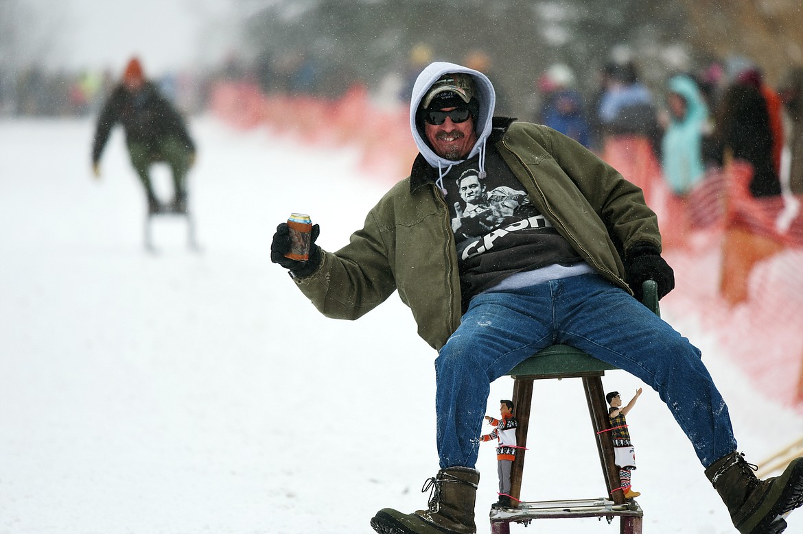 Participants race down Sugar Hill during Barstool Ski Races at Cabin Fever Days in Martin City on Saturday. (Casey Kreider/Daily Inter Lake)