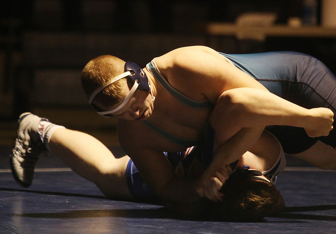 Lake City&#146;s Zane Monoghan turns Nick Dohm&#146;s shoulder during the 182 pound match at the TerHark Cup last week at Lake City High School. 

Photos: LOREN BENOIT/Press