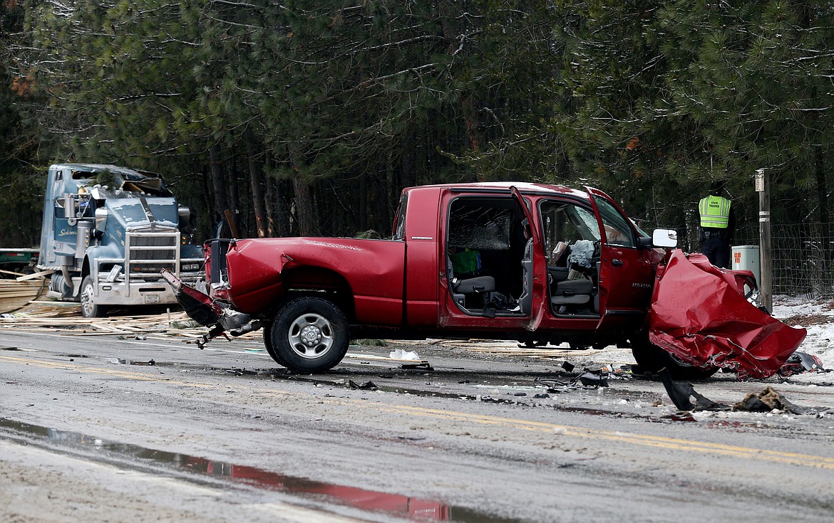 LOREN BENOIT/Press
A semi-trailer struck a red Dodge pickup near the intersection of Highway 53 and Atlas Road just east of Rathdrum on Monday. A Rathdrum woman and a Kalispell man were injured in the wreck.