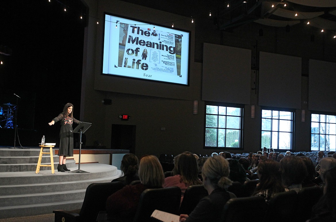 Mom and author Alexandra Kuykendall speaks in Lake City Community Church on Saturday about how fear acts as a barrier to women loving their actual lives. (DEVIN WEEKS/Press)