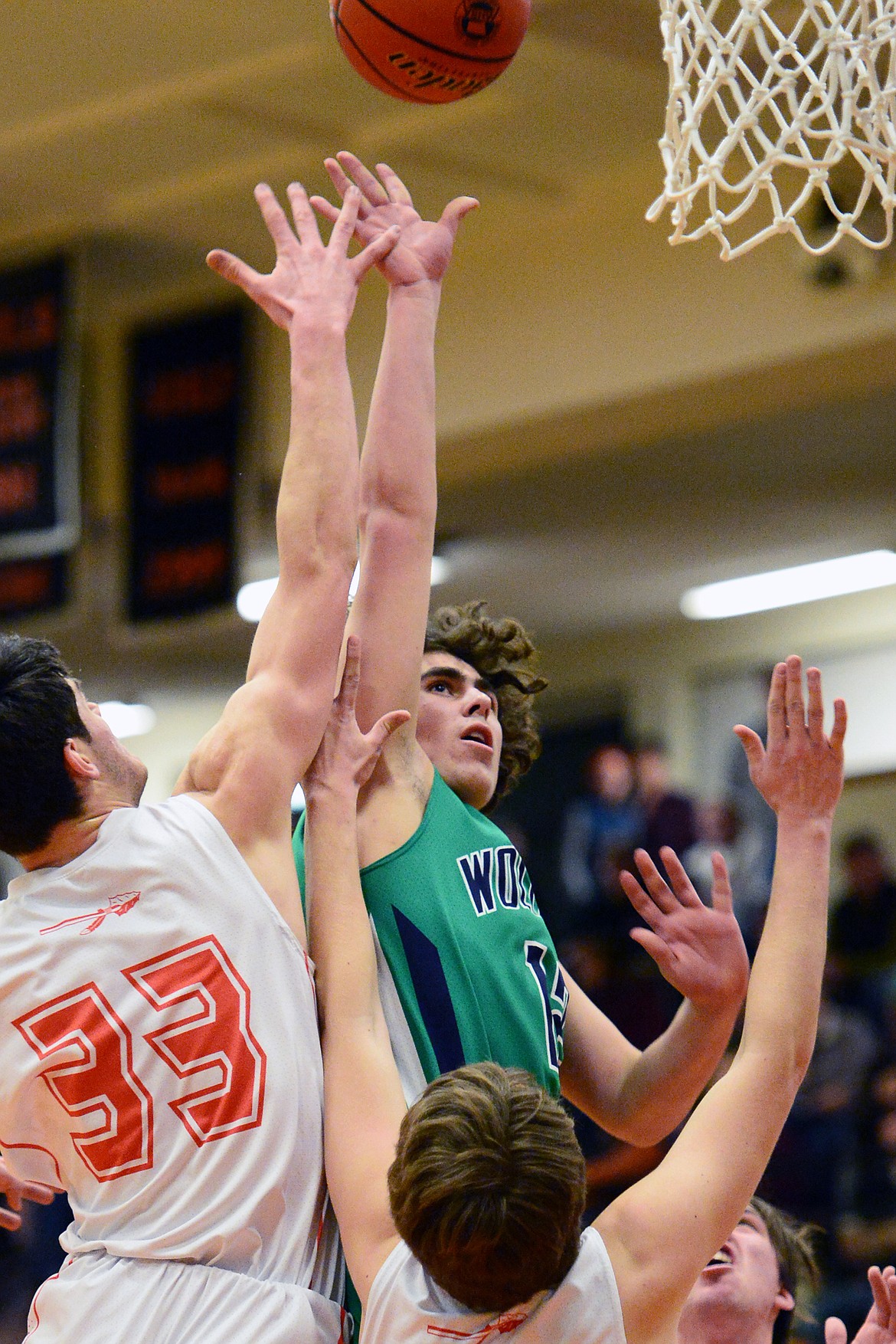 Glacier's Weston Price (12) releases a shot at the hoop against Flathead during a crosstown matchup at Flathead High School on Tuesday. (Casey Kreider/Daily Inter Lake)