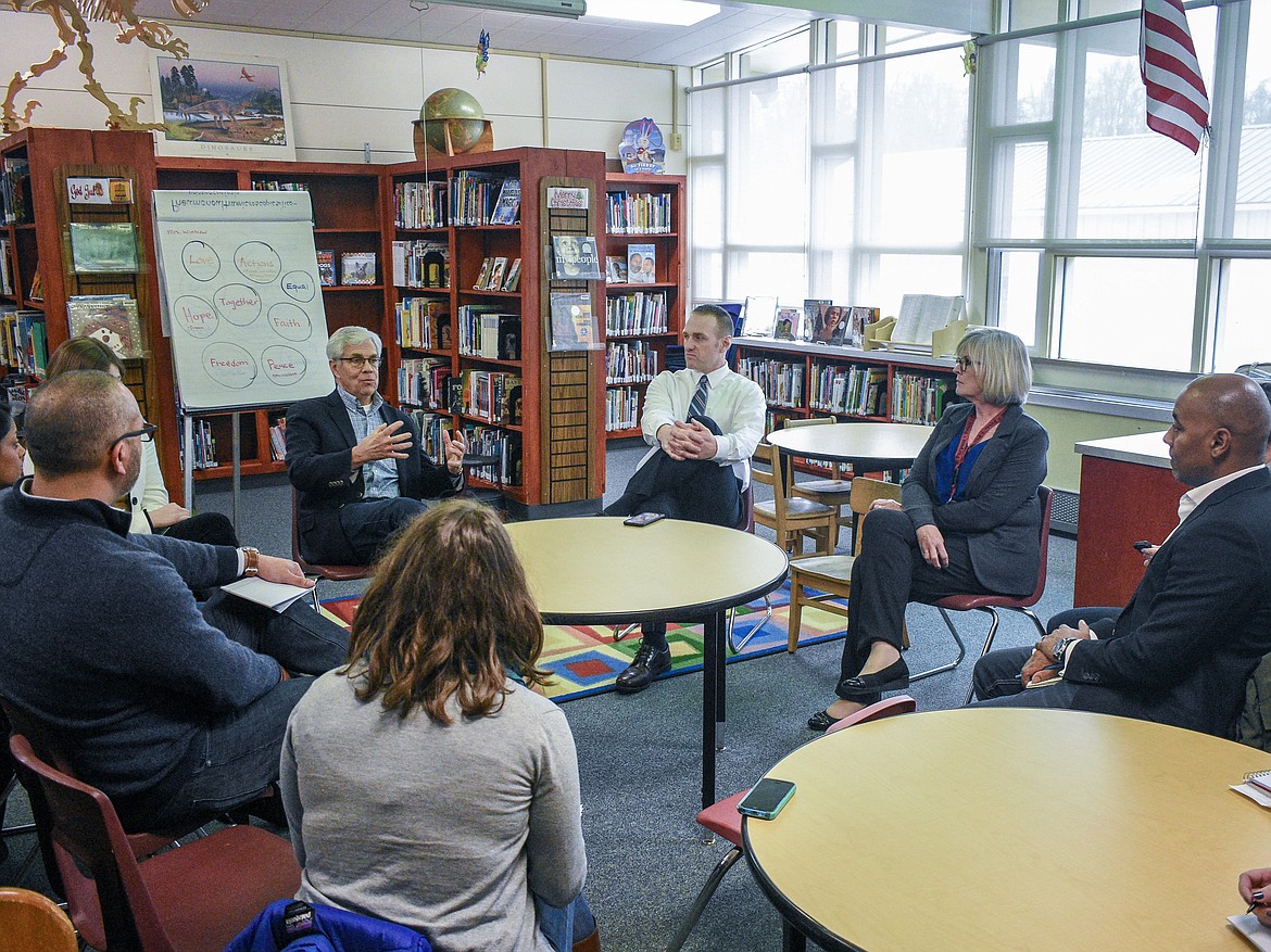 Montana Lt. Gov. Mike Cooney (left) visited schools in Troy Jan. 30 to discuss Internet both for the schools and the town as part of the Main Street Montana program. Cooney was accompanied by representatives of Deloitte, a firm researching current Internet needs and availability in Troy. To Cooney’s left are Troy Public Schools Superintendent/W.F. Morrison Principal Jacob Francom and W.F. Morrison Elementary Assistant Principal Diane Rewerts. (Ben Kibbey/The Western News)