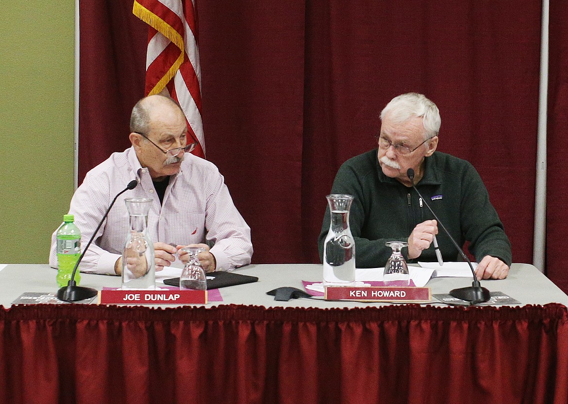 North Idaho College Board Members Joe Dunlap and ken Howard and other members of the board granted NIC staff the go-ahead to seek legislative approval to utilize the Idaho State Building Authority to finance building projects on campus. (LOREN BENOIT/Press)