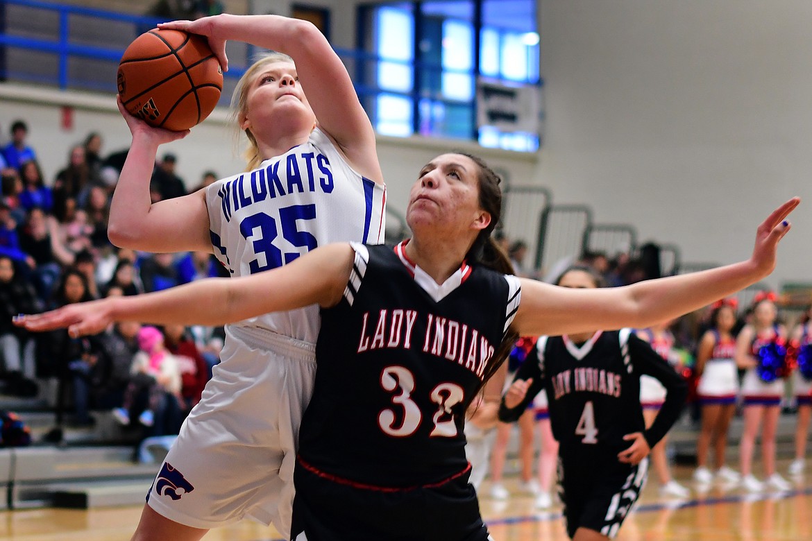 Trista Cowan goes up for two of her game-high 21 points over Browning's Taylor Jordan Saturday. (Jeremy Weber photo)