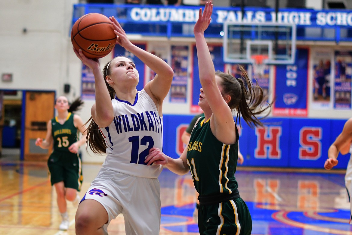 LaKia Hill goes up for two points against Whitefish Thursday. (Jeremy Weber photo)