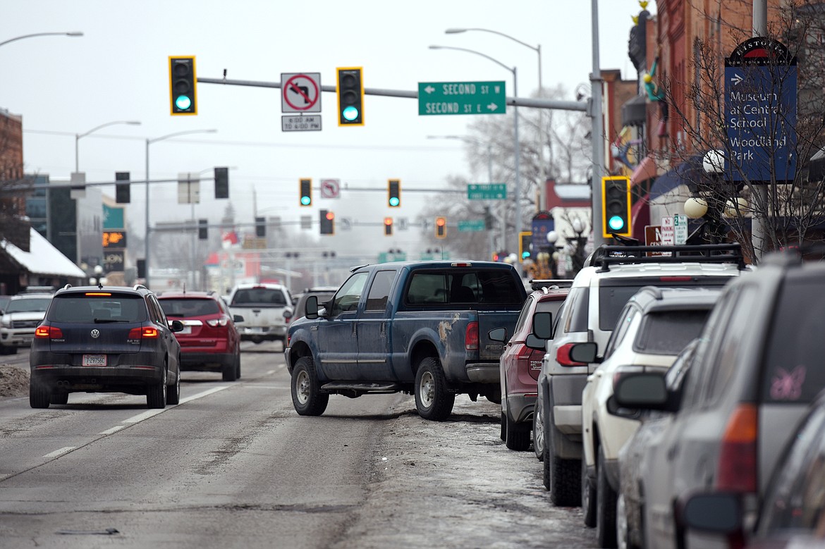 A truck pulls out of a parking space along South Main Street in Kalispell on Wednesday, Jan. 30. (Casey Kreider/Daily Inter Lake)