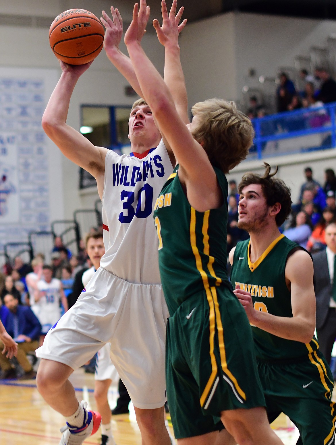 Zack Pletcher takes the ball up against Whitefish Thursday. (Jeremy Weber photo)