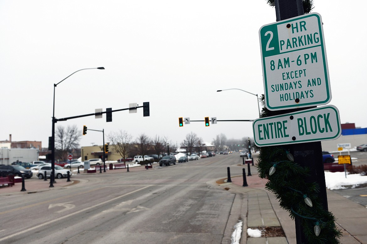 Signage and several open parking spaces at 1st Avenue West and 2nd Street West in Kalispell on Jan. 30. (Casey Kreider/Daily Inter Lake)