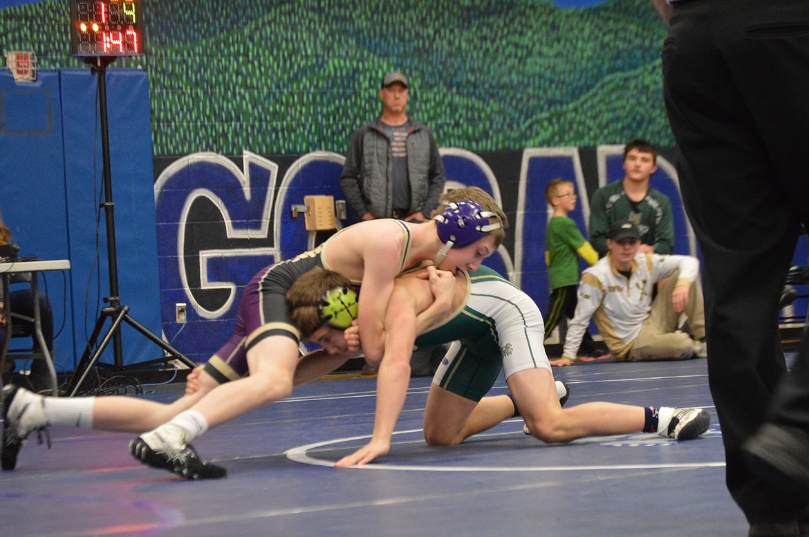 Carter Stepro locks up with his opponent on his way to a third place finish at the Bonners Ferry Tournament.