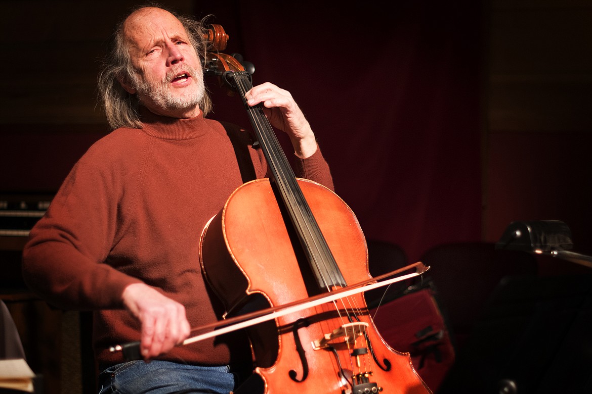 Cellist Lee Zimmerman rehearses his piece at the Angel Theater Monday. (Jeremy Weber photo)