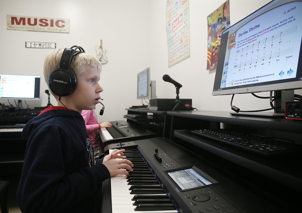 Fifth-grader Jacob Werner plays through a rhythm exercise during class Thursday at Ramsey Magnet School of Science. (LOREN BENOIT/Press)