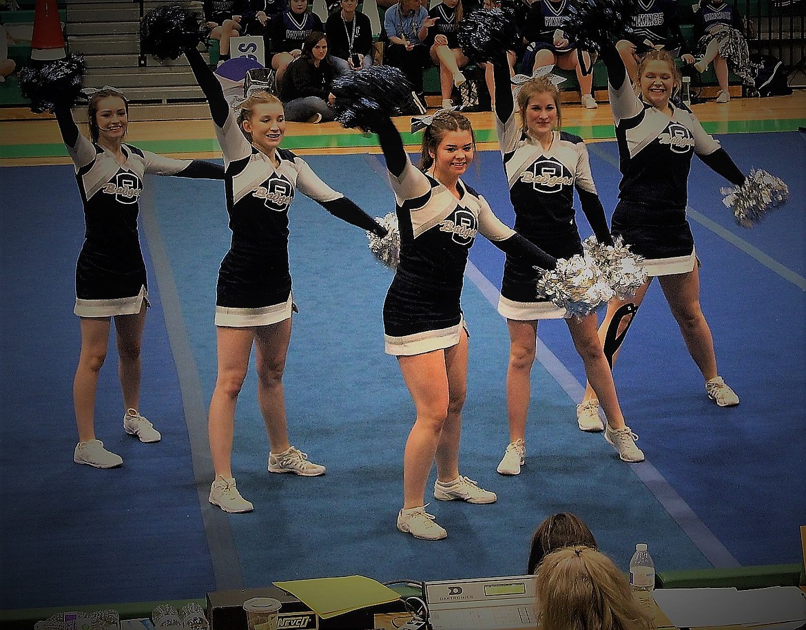 Courtesy photos
From left, Kylie Underhill, Hailey Brooks, Katie Summerfield, Isabella Sims and Kaylee Worley show their Badger pride at the Feb. 2 Prairie Classic cheerleading competition at Lakeland High School.