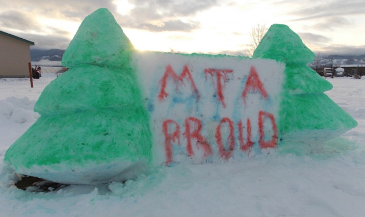 Jurek SHOWS that he is a proud member of the Montana Trapping Association (MTA) with this ice sculpture in Plains.
