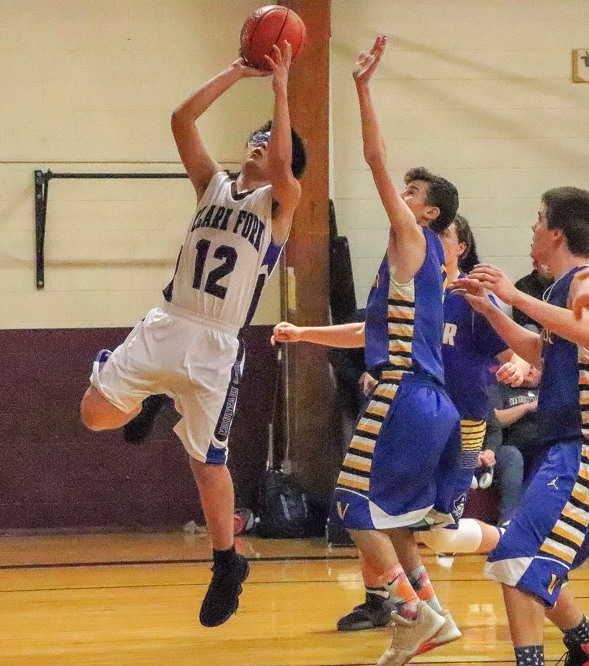 Nhan Hoang enjoys basketball and has learned new skills playing for the Clark Fork Mountain Cats JV team that he can take back home to Vietnam. (Photo by Rochelle Knapp)