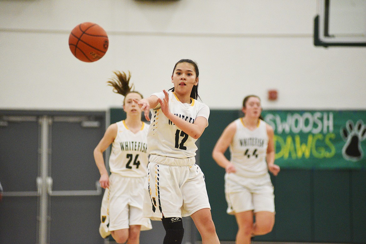 Jasmine Matern fires a pass to a Lady Bulldog teammate against Corvallis on Friday. (Daniel McKay/Whitefish Pilot)