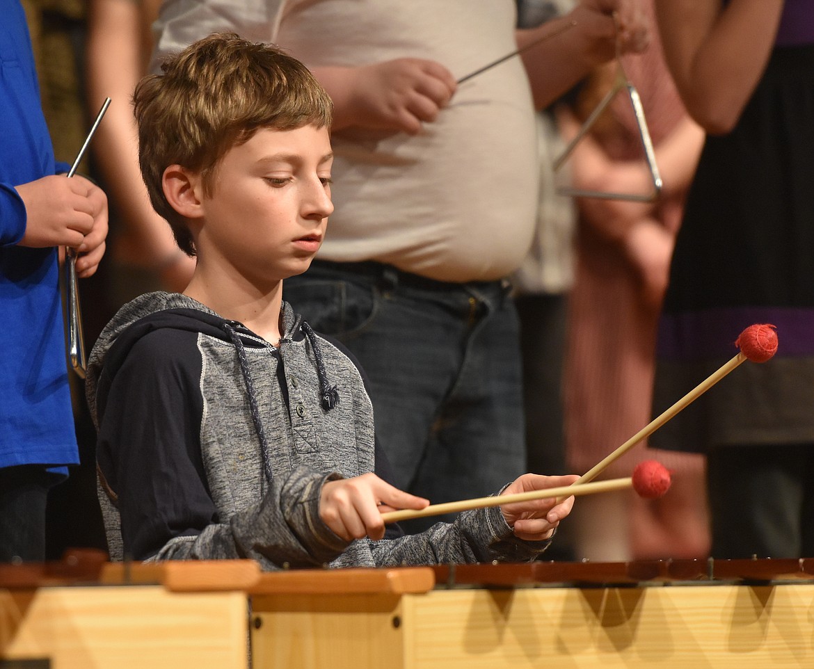 Fourth-grader Skylar Jolstead-Marquess concentrates while playing the xylophone during Linderman Elementary&#146;s Winter Music Program. (Joe Sova photos/Lake County Leader)