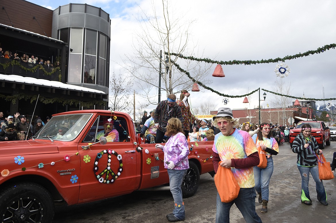 Whitefish Winter Carnival&#146;s 2019 Grand Parade on Saturday makes its way down Central Avenue. The theme was Whitefish Woodstock. (Heidi Desch/Whitefish Pilot)