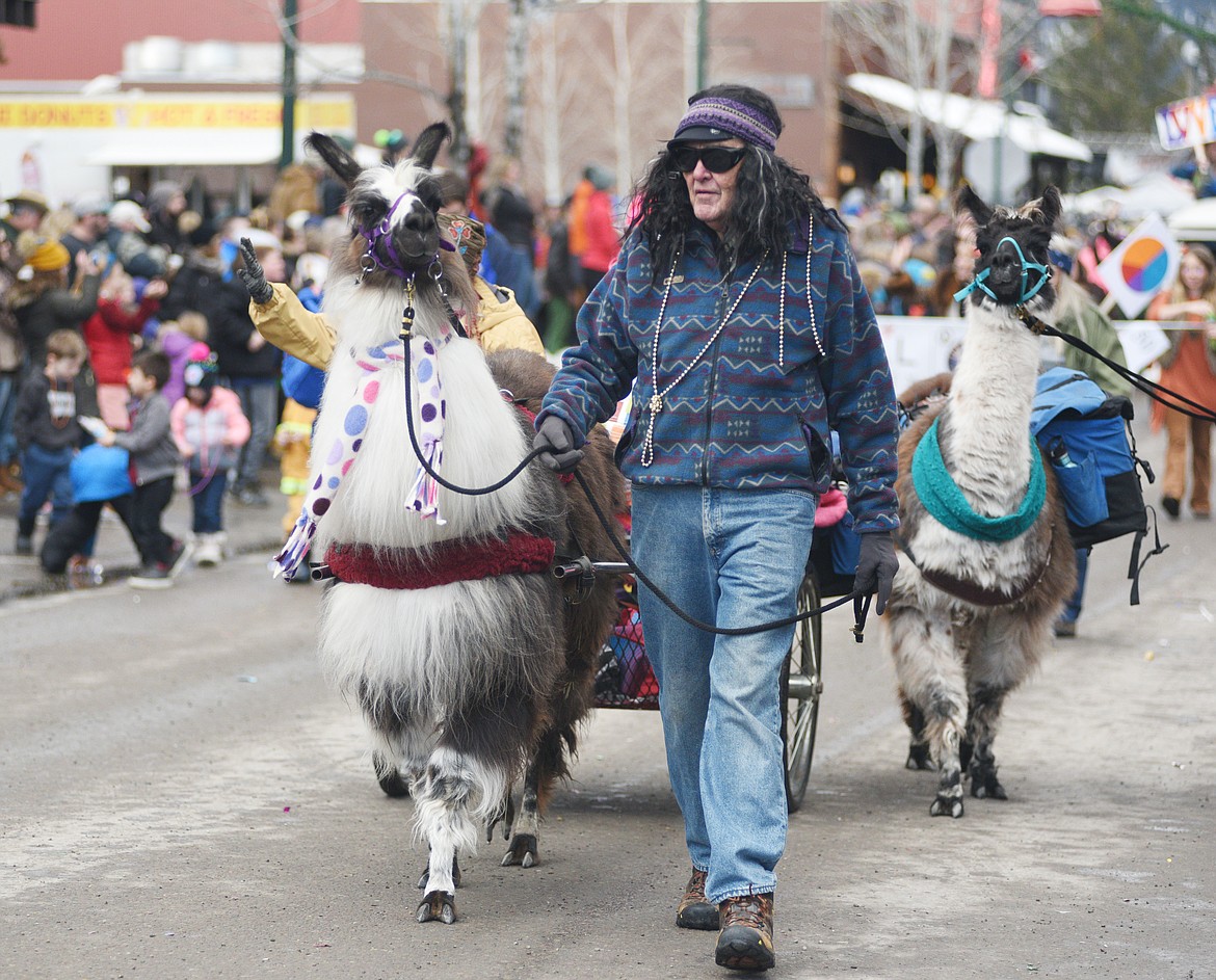 Whitefish Winter Carnival&#146;s 2019 Grand Parade on Saturday makes its way down Central Avenue. The theme was Whitefish Woodstock. (Heidi Desch/Whitefish Pilot)