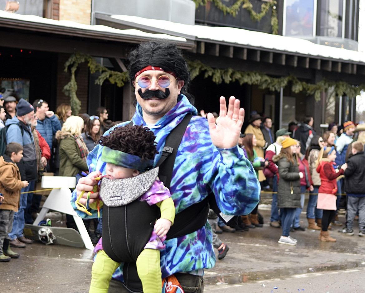 Whitefish Winter Carnival&#146;s 2019 Grand Parade on Saturday makes its way down Central Avenue. The theme was Whitefish Woodstock. (Heidi Desch/Whitefish Pilot)