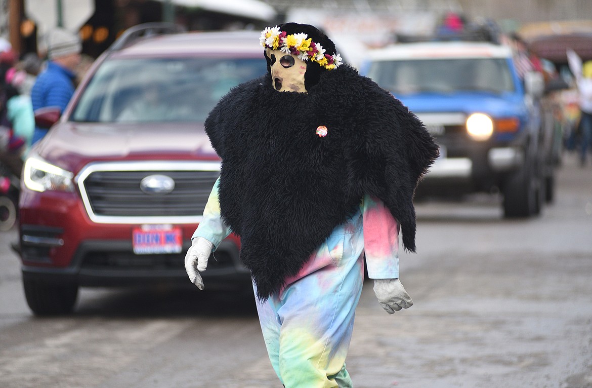 Whitefish Winter Carnival&#146;s 2019 Grand Parade on Saturday makes its way down Central Avenue. The theme was Whitefish Woodstock. (Heidi Desch/Whitefish Pilot)