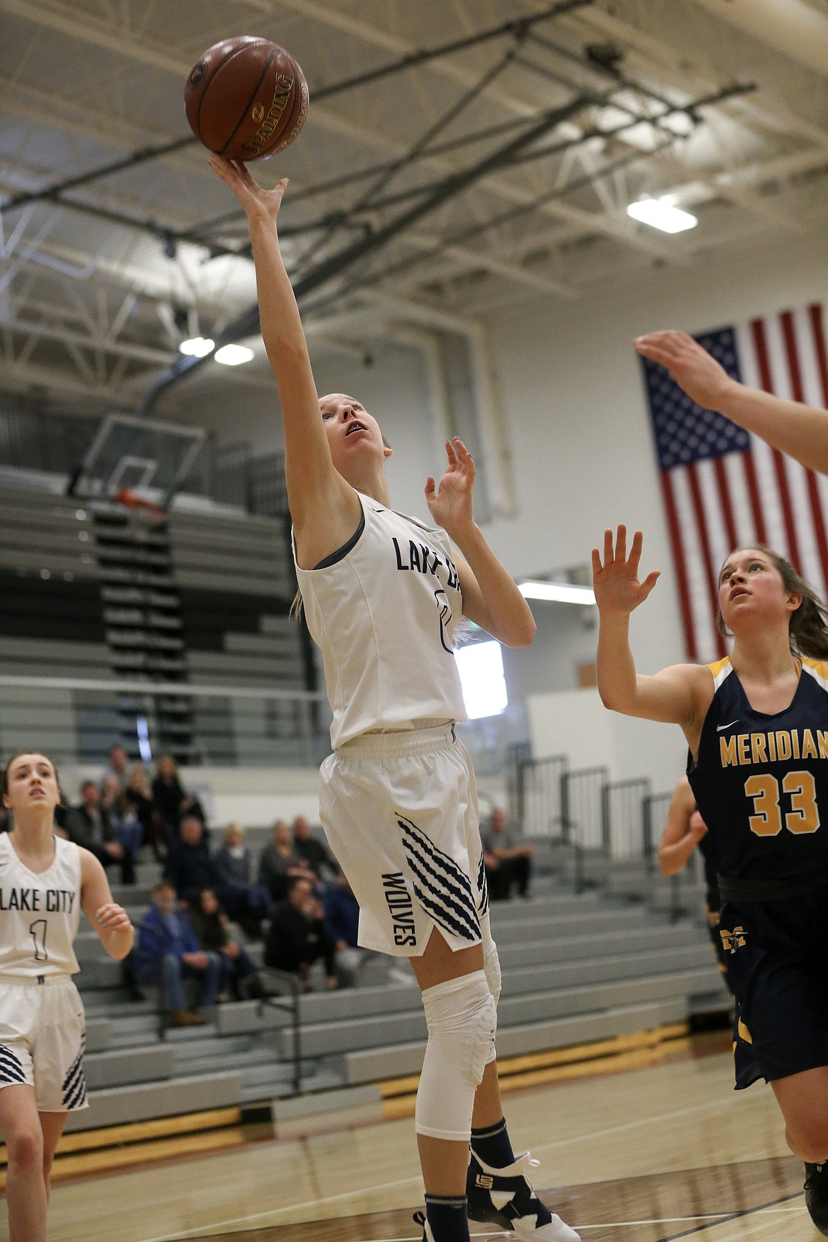 Photo by JASON DUCHOW PHOTOGRAPHY
Lake City freshman Kendall Pickford lays the ball up against Meridian in the 5A consolation championship game Saturday at Ridgevue High in Nampa.