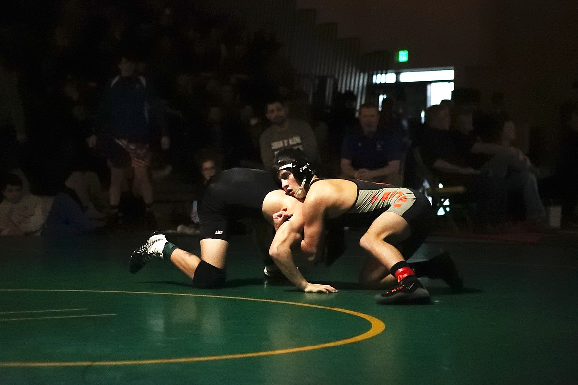 KYLE CAJERO/Bonner County Daily Bee
Post Falls junior A.J. De La Rosa grapples with Coeur d&#146;Alene sophomore Nolan Randles in the 5A 138-pound championship match.