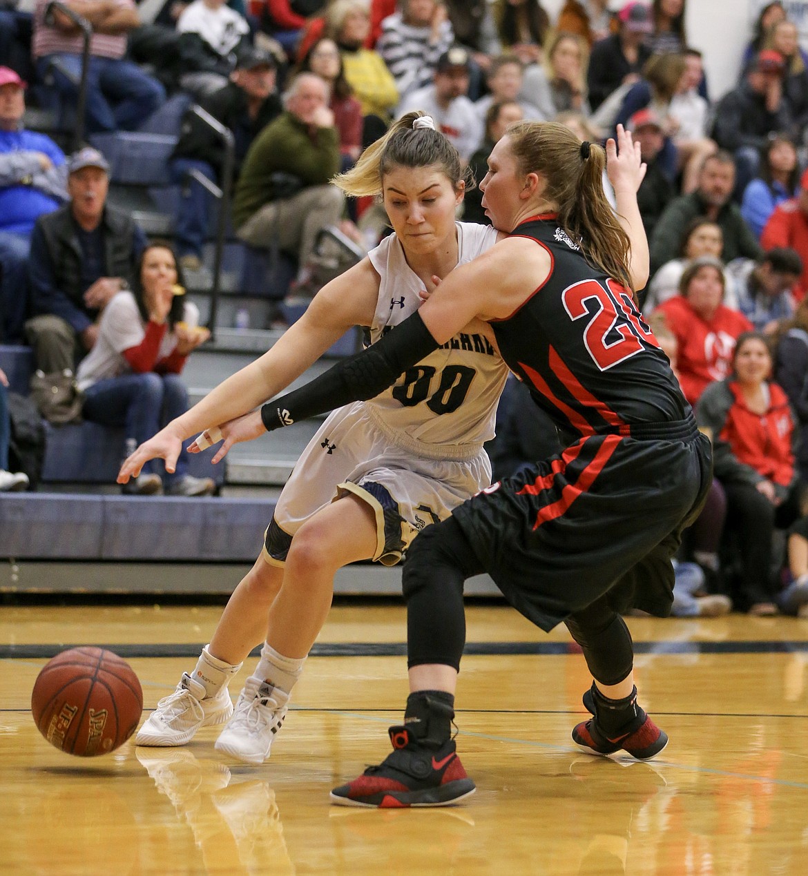 Photo by JASON DUCHOW PHOTOGRAPHY
Timberlake&#146;s McKeeley Tonkin drives against the defense of Parma&#146;s Grace Johnson in the semifinals of the state 3A girls basketball tournament Friday night at Skyview High in Nampa.