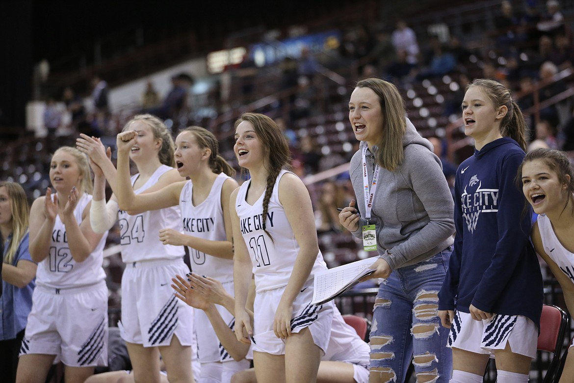 Photo by JASON DUCHOW PHOTOGRAPHY
The Lake City Bench celebrates after teammate Bridget Rieken scores and draws a foul, sending her to the free-throw line against Rigby in a loser-out game at the state 5A girls basketball tournament Friday at the Ford Idaho Center in Nampa.