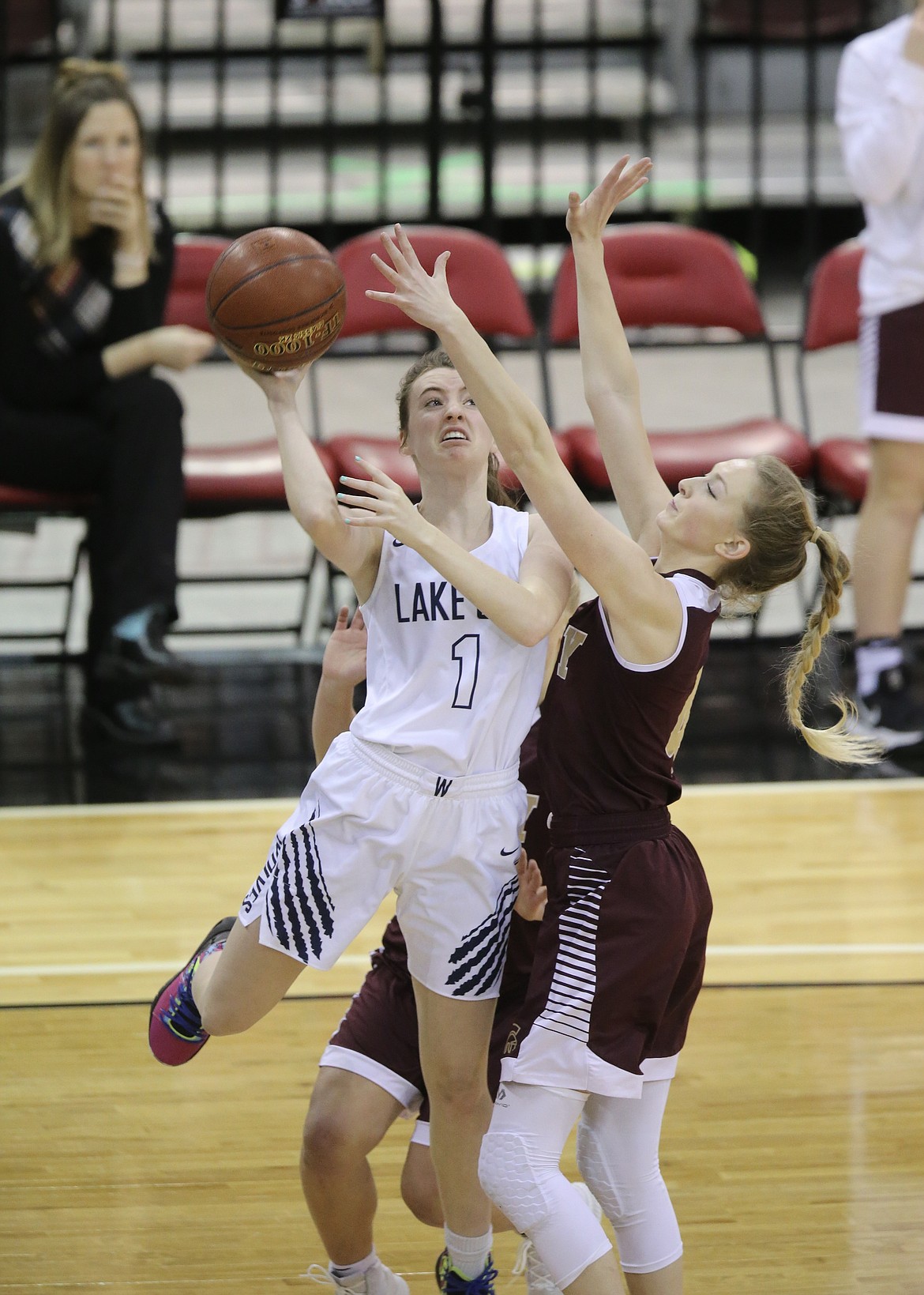 Photo by JASON DUCHOW PHOTOGRAPHY
Aubrey Avery of Lake City goes up for a shot on the baseline Friday against Rigby in a loser-out game at the state 5A girls basketball tournament at the Ford Idaho Center in Nampa.