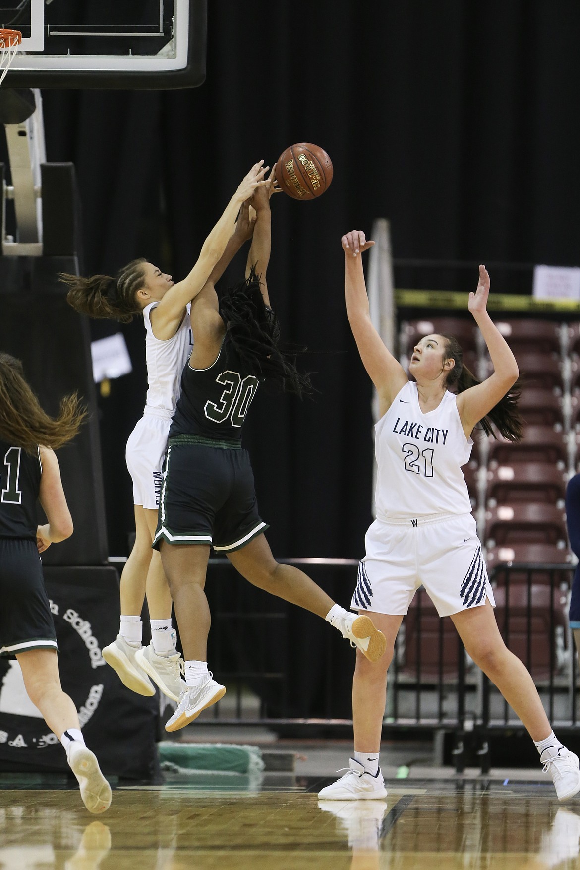 Photo by JASON DUCHOW PHOTOGRAPHY
Klaire Mitchell of Lake City blocks the shot of Eagle&#146;s Jaime McKinnie on Thursday in the first round of the state 5A girls basketball tournament at the Ford Idaho Center in Nampa.